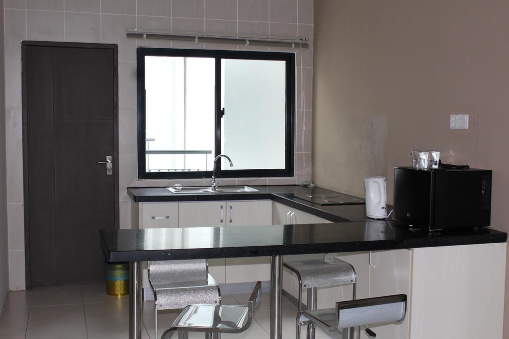 Tribeca Suites Кучінг Екстер'єр фото